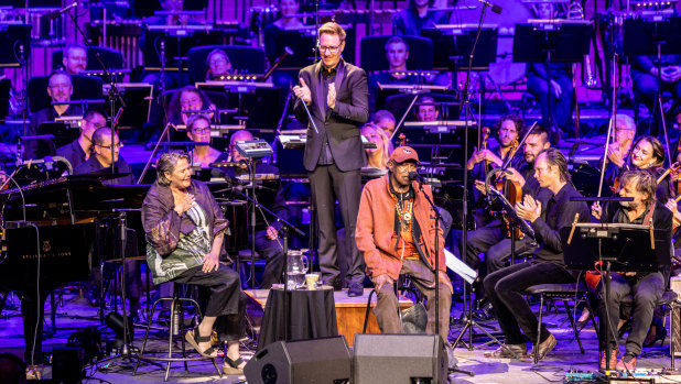 Archie Roach and the Melbourne Symphony Orchestra on stage at the Sidney Myer Music Bowl.