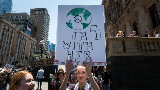 School children striking from school and protesting in the streets of Melbourne for the government to take action on climate change.