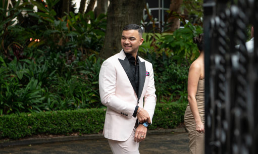 Singer Guy Sebastian waits for his wife, Jules, outside Swifts.