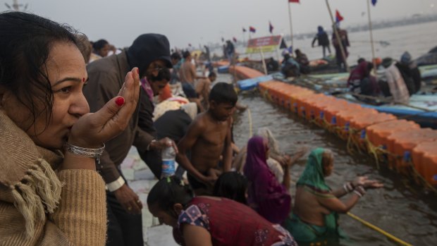 Pilgrims converge on the rivers to cleanse themselves as part of the large religious congregation. 
