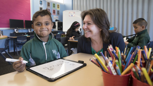 Robert, 5, with principal Michelle  Gallop at Whalan Public School. 