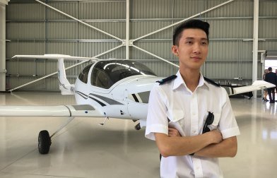Kenny Zhang has moved from Sydney to Toowoomba to fulfil his childhood dream of becoming a pilot. 