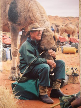 Wilkinson in the Simpson Desert in 2006 with one of his camels.