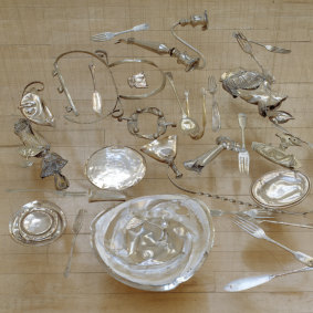 Cornelia Parker's Thirty Pieces of Silver (detail), 1988–89, silver-plated objects flattened by a steamroller. 