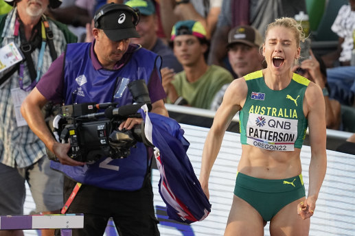 Gold medallist Eleanor Patterson celebrates her victory.