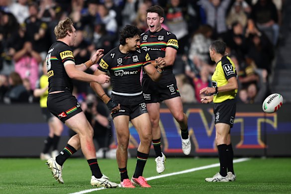 Casey McLean celebrates a try at CommBank Stadium.