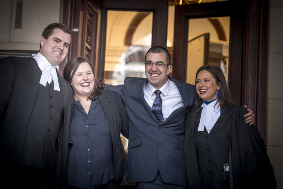 Faruk Orman (third from left) with Ruth Parker (second from left) on the steps of the Supreme Court after his conviction was quashed.