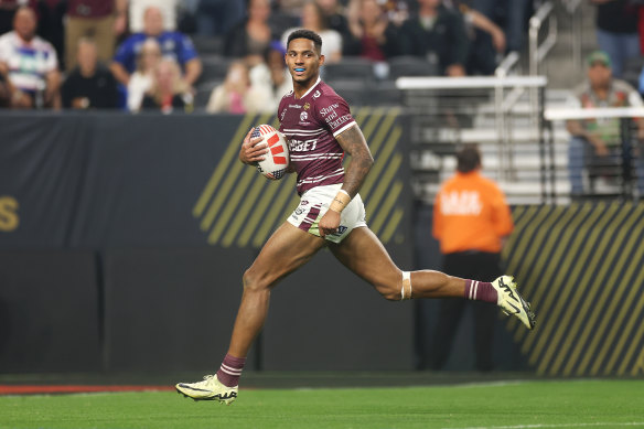 Jason Saab streaks away to score a try.