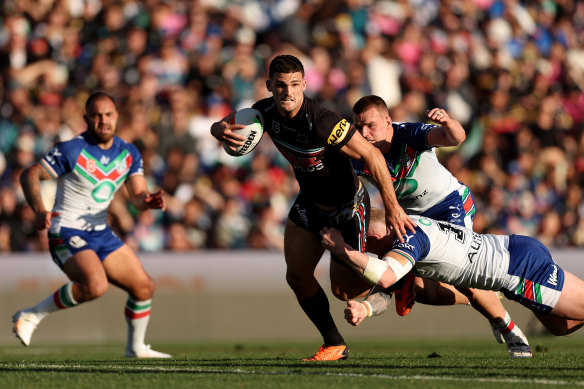 Nathan Cleary makes a line break in Saturday night’s game against the Warriors.