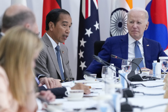 US President Joe Biden watches as Indonesian President Joko Widodo, left, speak about global infrastructure and investment at the G7 Summit in Hiroshima on the weekend.