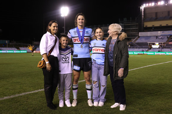 Nicho Hynes with the family of the late Paul Green after Thursday night’s match.