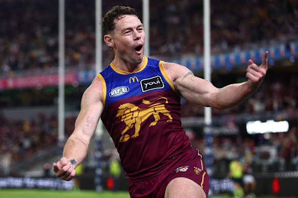 Lachie Neale celebrates a goal.