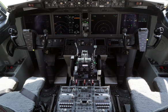 The cockpit of a grounded Boeing 737 MAX jet. Plane manuals and pilot-training materials didn’t have any reference to new flight control software that was later linked to both fatal tragedies.