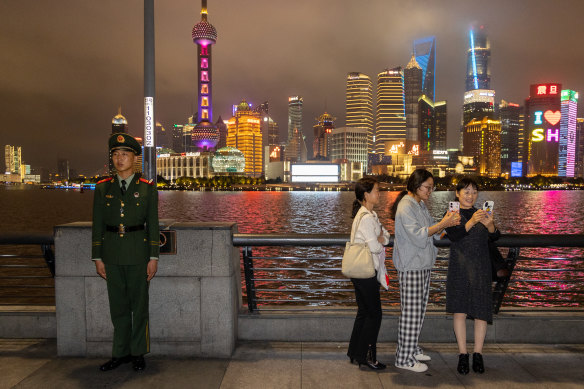 The Chinese military guards the Bund in Shanghai on Sunday night