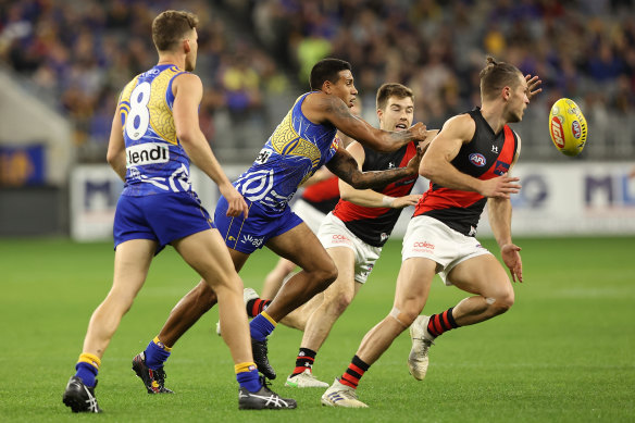 Tim Kelly gets a pass away against Essendon before being injured.