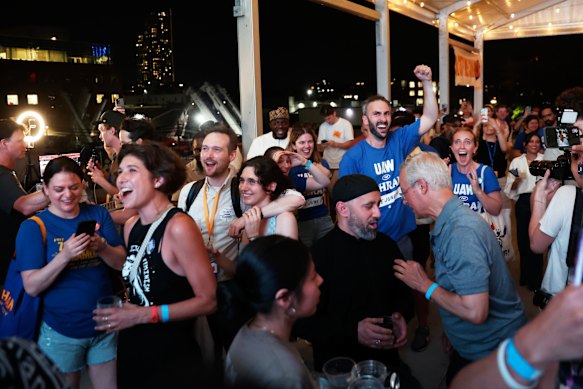 Jubilant Mamdani supporters celebrate as election results trickle in.