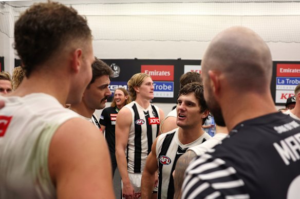 Lachie Schultz talking to teammates after Thursday night’s win in which he copped a heavy knock.