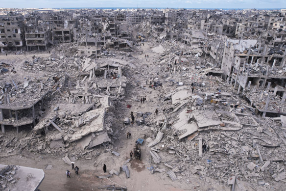 An aerial photograph taken by a drone shows displaced Palestinians returning to Rafah, a day after the ceasefire deal between Israel and Hamas came into effect, Gaza Strip.