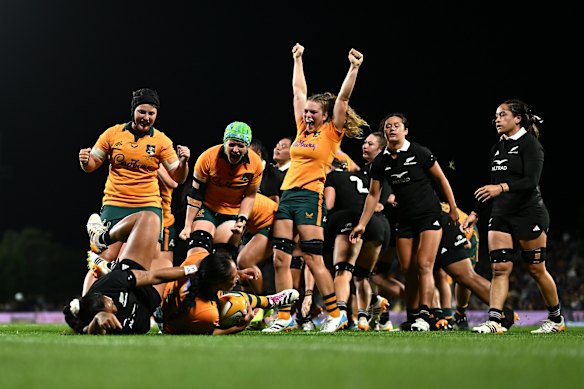 Wallaroos celebrate a Siokapesi Palu try during the O’Reilly Cup match.