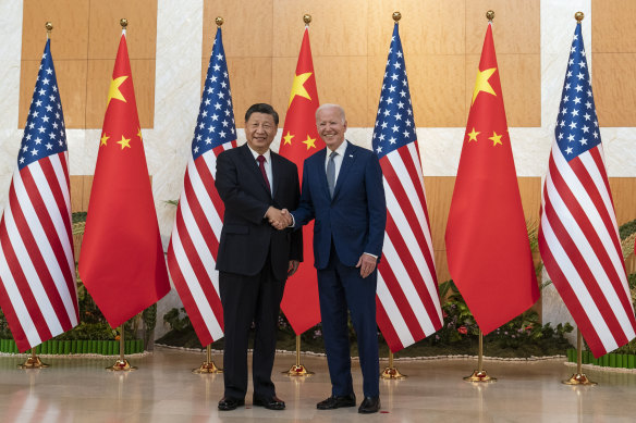 US President Joe Biden  and Chinese President Xi Jinping shake hands before the meeting.
