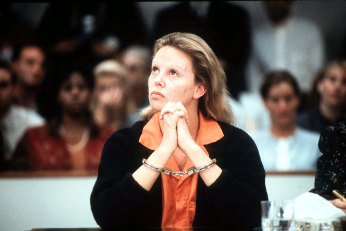 Charlize Theron as Aileen Carol Wuornos in Monster.