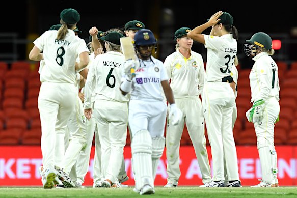 Shafali Verma walks after being dismissed by Georgia Wareham on Sunday.