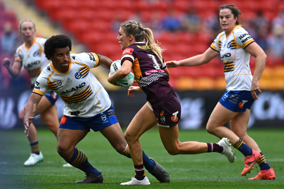 Hayley Maddick of the Broncos hits it up against the Eels.