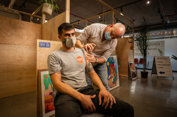 Joe Laney getting the AstraZeneca vaccine at the Inner North Medical Clinic in Brunswick East.