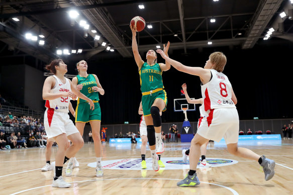 Australia’s Tess Madgen drives to the basket against Japan.