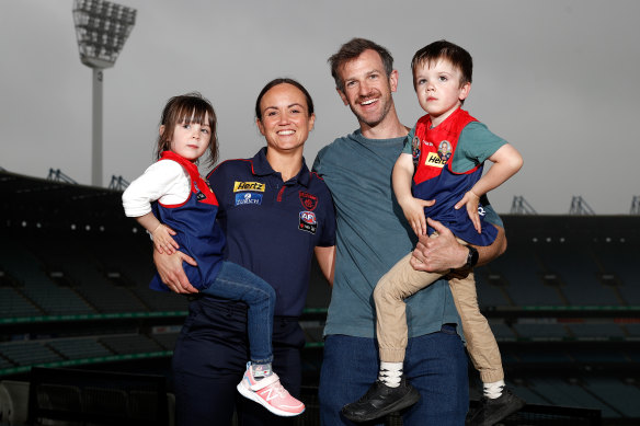 Daisy Pearce, with daughter Sylvie, husband Ben O’Neill with their son Roy, when Pearce retired as a Melbourne player early last year. The family has since relocated to Perth.