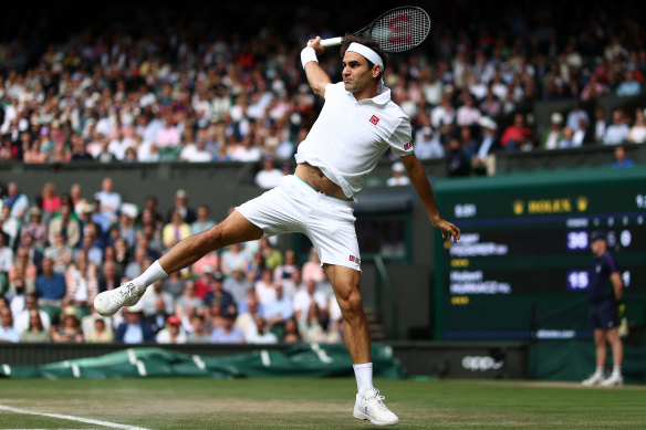 Roger Federer works his magic at Wimbledon in 2021.