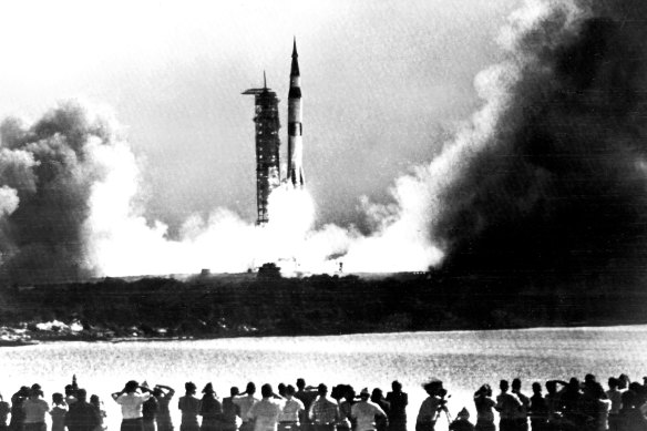 Photo of Saturn 5 blasting off published on the front page of the Herald, 17 July 1969