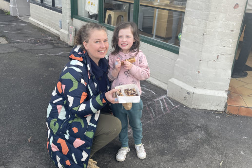 Jess O’Donnell and daughter Abby, 4, bought some caramel slices.