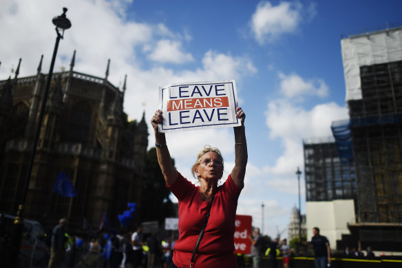 Protesters gathered outside Parliament as the drama played out inside.