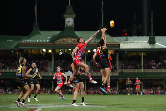 Peter Ladhams contests a high ball at the SCG.