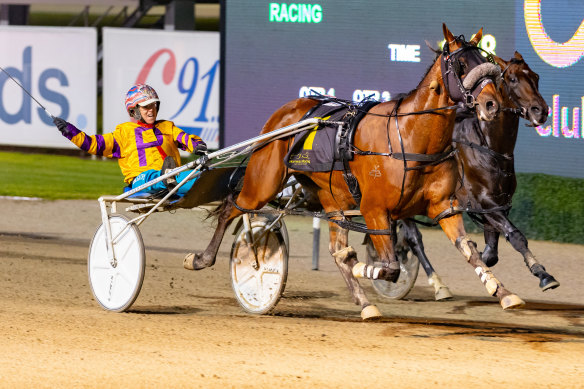 Kate Gath drives Catch A Wave to the front in the final stages of the Chariots Of Fire at Menangle on Saturday.