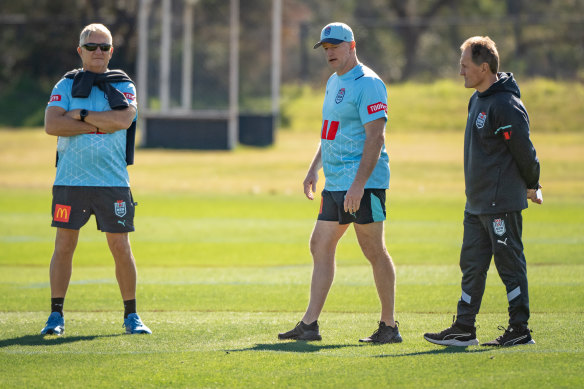 Blues coach Michael Maguire (centre) leads a training at Blue Mountains Grammar School this week. 