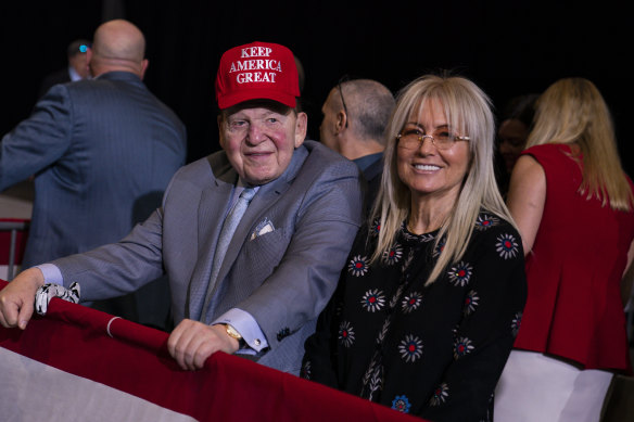 Sheldon Adelson and his wife Miriam await the arrival of President Donald Trump at a campaign rally in Las Vegas last year.