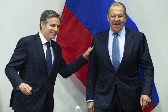 US Secretary of State Antony Blinken, left, greets Russian Foreign Minister Sergey Lavrov.