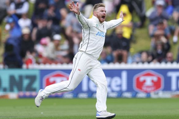 Glenn Phillips celebrates his fifth wicket.