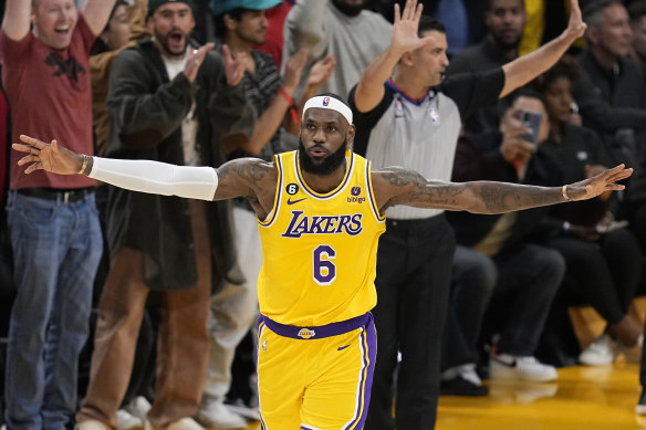 LeBron James celebrates after claiming the record.