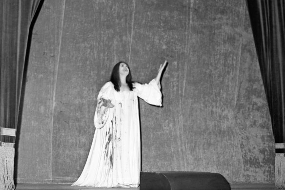 Joan Sutherland takes one of 17 curtain calls after her performance.