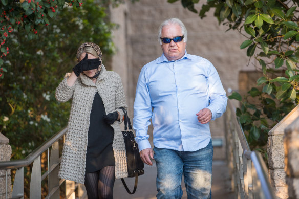 Liudmila and Con Petropoulos leave a court in June 2019.