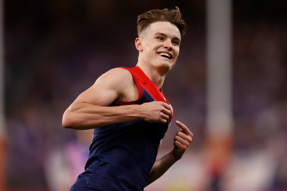 On fire: Bayley Fritsch celebrates his fifth goal during the AFL grand final. 
