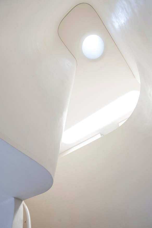 Curves and skylights give the illusion of never-ending space.