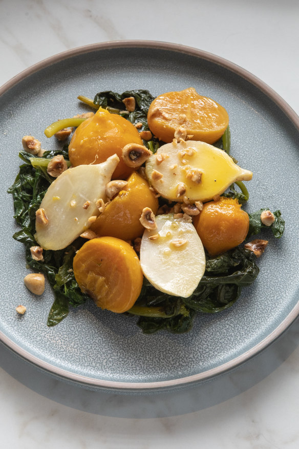 Turnip and beetroot with hazelnuts, beet greens and garlic.