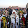 Druids, selfies and weak flat whites: Ancient traditions mix with the new at Stonehenge