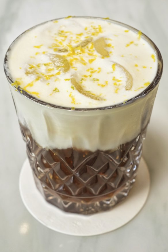 The signature “Citrusy Moustache” (cold brew coffee topped with orange-infused whipped cream).