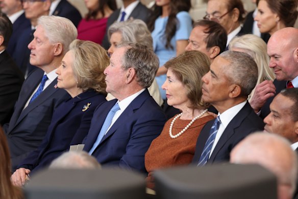 Former presidents and first ladies watch the inauguration address.