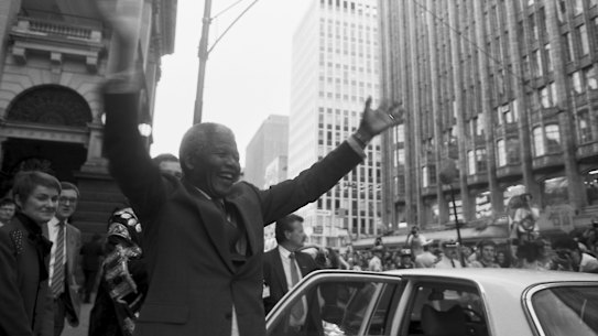 Nelson Mandela arrives at Melbourne Town Hall on a tour of Australia in 1990.